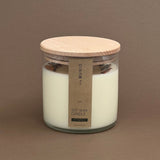 CINNAMON CANDLE IN GLASS VOTIVE WITH 2 WICKS