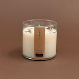 GREEN MEADOW CANDLE IN GLASS VOTIVE WITH 2 WICKS